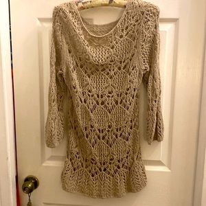 Crochet sweater. Would look great over black tank
